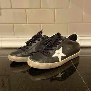 Black leather Golden goose sneakers. Preordered from bergdorf.
